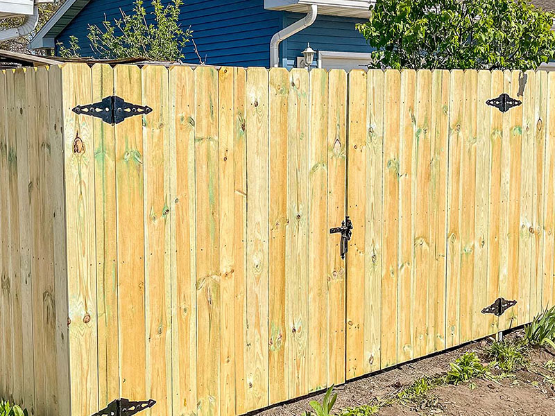 Pressure treated pine fence in Cedar Valley