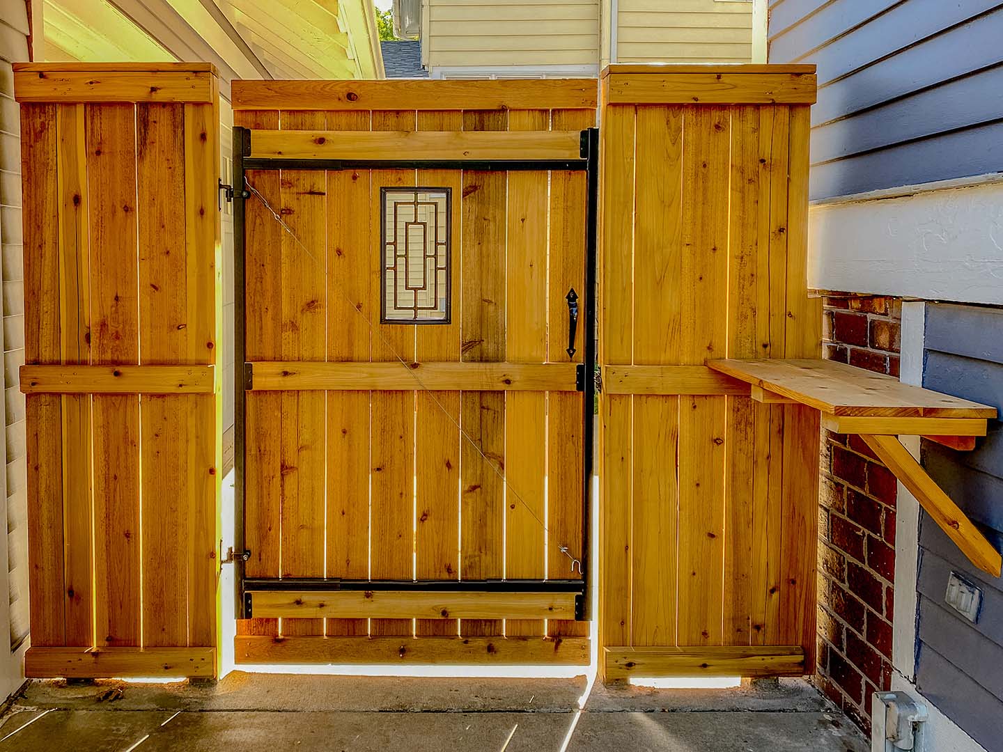 Stained cedar wood fence in Cedar Valley