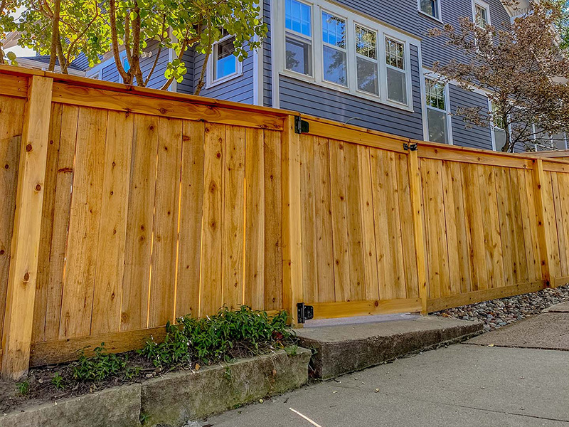 Dike IA cap and trim style wood fence