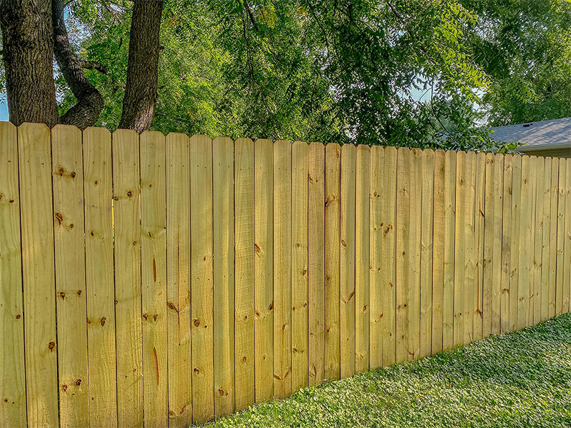 Dike IA stockade style wood fence